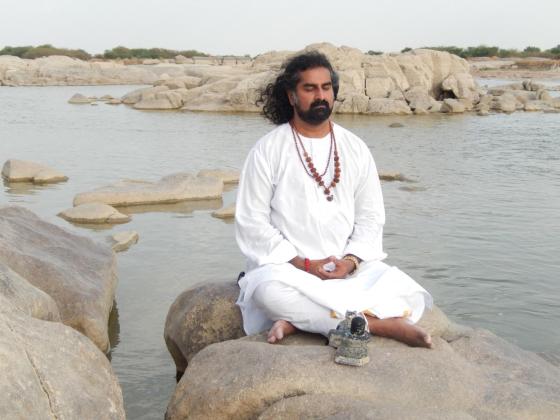 Mohanji in communion with the Almighty at the Krishna river.