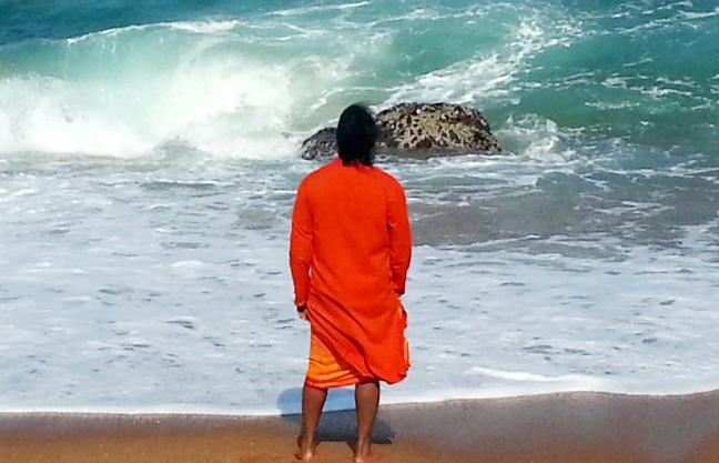 Mohanji on the beach of the Indian Ocean in Durban