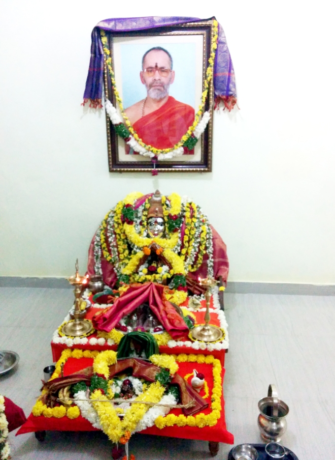 Divine Mother and the photo of Swamy Thyagananda's Guru
