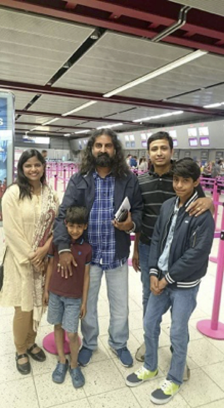 Mohanji with Subhashree Family at the Airport.jpg