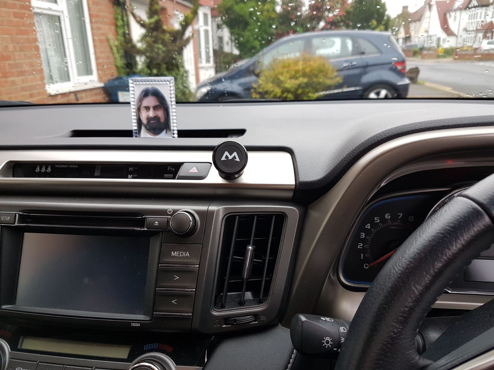 mohansuniverse - Mohanji - Mohanji frame in car dashboard