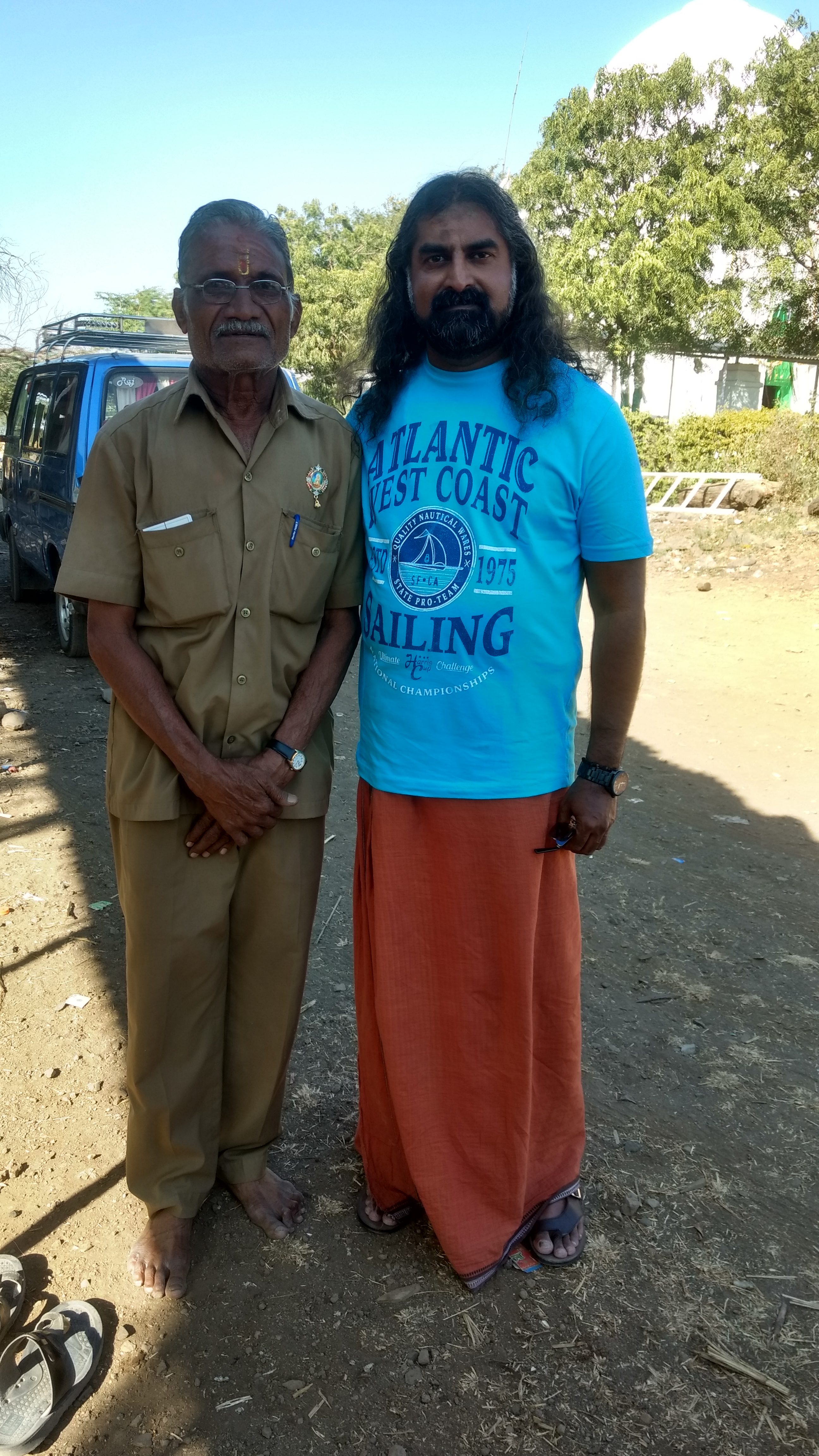 Mohanji Chronicles - Back from the dead – A tryst with Swami Samarth of Akkalkot - Mohanji with security guard.jpg